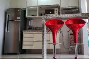 FRODO-APTO 2 dorm, wifi, ar cond suite, vaga garagem