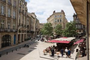Appartements Place du Palais : photos des chambres