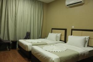 Alpha Suites Hotel