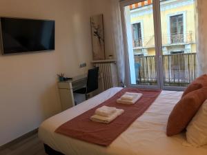 Appartements LE GRUFFAZ - Hyper centre, Balcon sur canal : photos des chambres