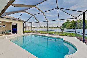 Three-Bedroom House room in Stylish Getaway - Screened Lanai with Heated Pool home