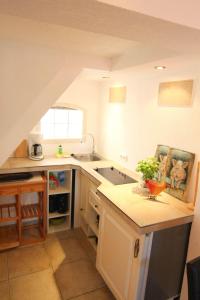 Kapitaenshaus-Lassen-Zimmer-Rosenhaus