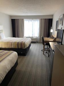 Queen Room with Two Queen Beds room in Country Inn & Suites by Radisson Merrillville IN