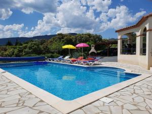 Villas Air conditioned villa with heated pool guesthouse and stunning views : photos des chambres