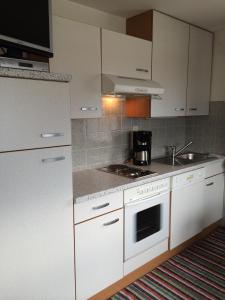 Family Apartment with Balcony (2 Adults + 2 Children) room in Haus Eiter