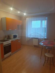 Two-Bedroom Apartment room in Квартира посуточно Morozova 111