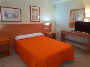 Hostal Carlos III - La Mujer
