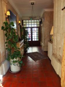 Hotels Au Saint Roch - Hotel et Jardin : photos des chambres