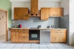 Appartements Travel Homes - The Wooden, Spacieux & bon quartier : photos des chambres