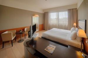 Standard Double or Twin Room with Extra bed (2 Adults + 1 Child) room in NH Linate