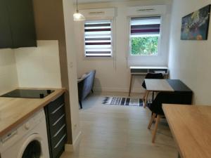 Appartements Studio calme avec parking : photos des chambres