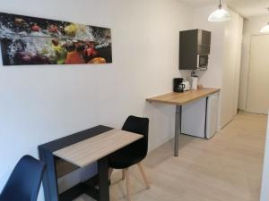 Appartements Studio calme avec parking : photos des chambres