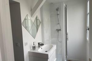 Appartements T1 bis 35 m2 lit queen size tout equipe : photos des chambres