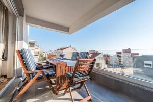 Blue sky, modern sea view apartment