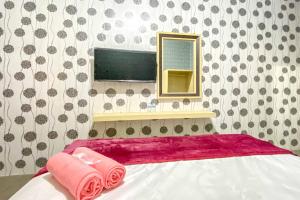 Tinis Guest House Malang Mitra RedDoorz