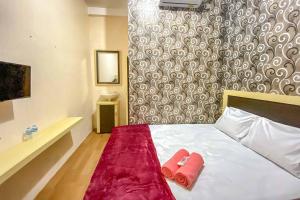 Tinis Guest House Malang Mitra RedDoorz