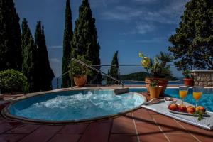 Luxury Beachfront Villa Dubrovnik Palace with private pool and jacuzzi by the beach in Dubrovnik
