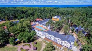 Apartamenty Poddąbek- basen kryty, sauna, animacje dla dzieci , małpi gaj, baseny na dachu