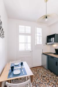 Appartements LIK APPARTS Gare Rennes - Appart LE HERON : photos des chambres