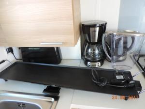 Maisons de vacances Bungalow Confort Gastes Jacuzzi : photos des chambres