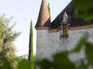 Maisons de vacances Grand Castle in Saint Caprais de Lerm with Sauna Bubble Bath : photos des chambres