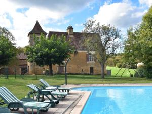 Maisons de vacances Vintage Holiday Home in Besse with Swimming Pool : photos des chambres