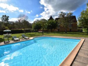 Maisons de vacances Vintage Holiday Home in Besse with Swimming Pool : photos des chambres