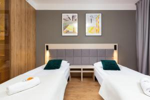 Wolska Residence Apartments with Parking by Noclegi Renters