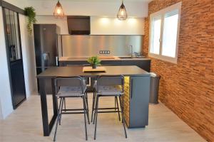 Appartements Confort et Decoration Soignee a Carqueiranne : photos des chambres