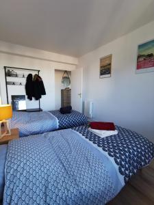 Appartements Le Kelenner-appartement bord de mer tout a pieds ou a velo : photos des chambres