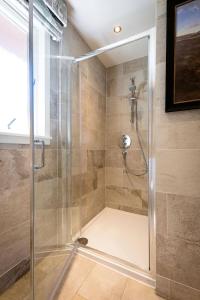 Deerstalker Lodge cozy lodge with wood burner