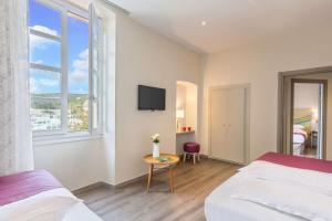 Hotels Best Western Hotel du Roy d'Aragon : photos des chambres