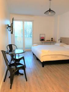 Appartements Bel appartement design tout confort (Parking Gratuit) a 10 minutes de Bordeaux : photos des chambres