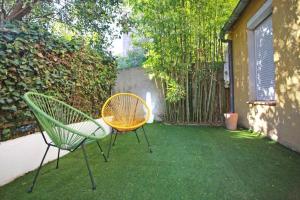 Appartements GregBnb-com - T2 50m2 - Jardin 80m2 - 15min gare : photos des chambres