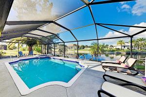 Three-Bedroom House room in Waterfront Oasis - Private Caged Pool Spa & Dock home