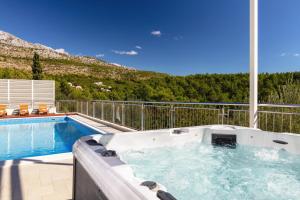 Luxury Villa Lovric with private heated pool, Jacuzzi, Sauna and private tavern