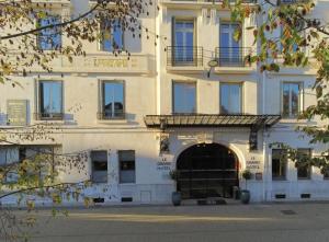 Hotels Le Grand Hotel : photos des chambres