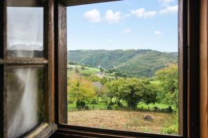 Maisons de vacances Maison de 3 chambres avec jardin amenage et wifi a Senezergues : photos des chambres