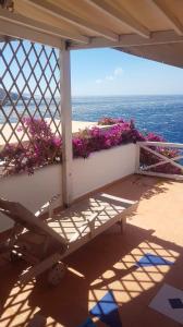 Apartment with one bedroom in Ormos Kardianis with wonderful sea view furnished terrace an Tinos Greece