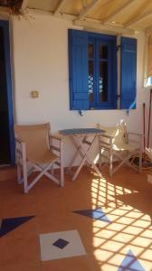 Apartment with one bedroom in Ormos Kardianis with wonderful sea view furnished terrace an Tinos Greece