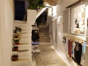 Apartment with one bedroom in Ormos Kardianis with wonderful sea view furnished terrace an Tinos Greece