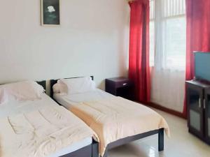 Rumah Pahoman Syariah Mitra RedDoorz