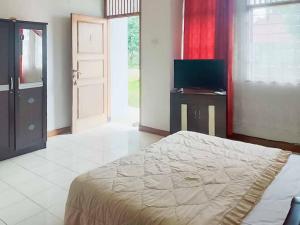 Rumah Pahoman Syariah Mitra RedDoorz