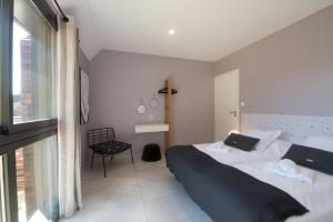 Appartements Le Lumineux avec Jacuzzi Privatif et parking prive : photos des chambres