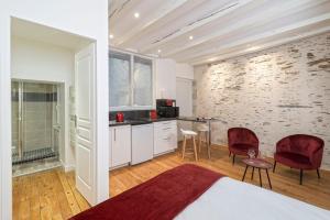 Appartements Hypercentre calme et cosy Impasse Saint Julien, 1er etage : photos des chambres