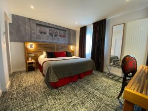 Hotels Logis - Le Christina : photos des chambres