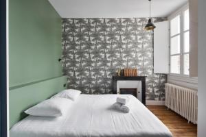 Appartements Les Trois Rois - Duplex Familial de Charme en coeur de ville : photos des chambres