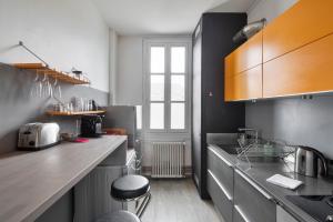 Appartements Les Trois Rois - Duplex Familial de Charme en coeur de ville : photos des chambres