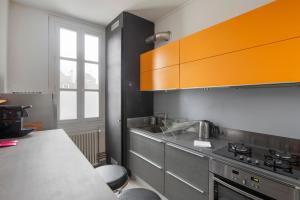 Appartements Les Trois Rois - Duplex Familial de Charme en coeur de ville : photos des chambres