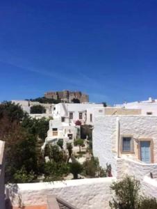 House with 4 bedrooms in Patmos with wonderful sea view terrace and WiFi 1 km from the bea Patmos Greece